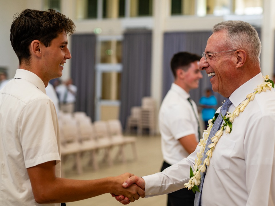 Elder Ulisses greets a missionary in French Polynesia on 26 April 2024.