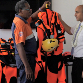 Manea-Tuahu-(pictured-on-the-right)-and-Sam-Roscol,-project-chair,-inspect-rescue-equipment-donated-by-The-Church-of-Jesus-Christ-of-Latter-day-Saints.