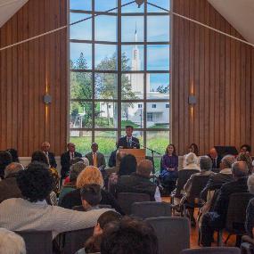 Elder-Kazuhiko-Yamashita-speaks-in-the-George-R.-Biesinger-Hall-adjacent-to-the-Hamilton-Temple-during-the-opening-of-a-new-exhibit-on-labour-missionaries-at-the-church-history-museum-in-Temple-View.-New-Zealand,-May-2021