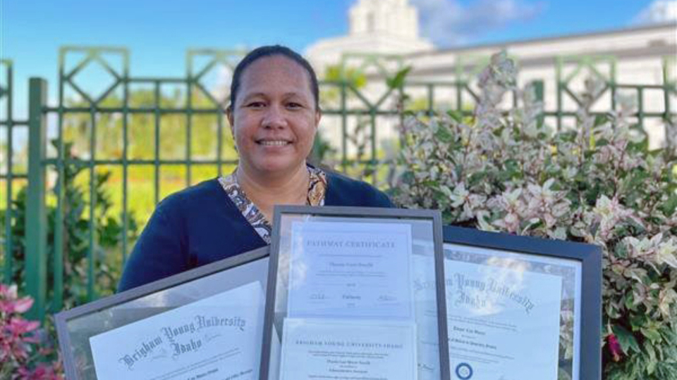 Lani-Smolik-shows-her-three-academic-degrees-and-certificates-that-she-earned-through-the-BYU-Pathway-Worldwide-program-while-living-in-Samoa.-September-2021