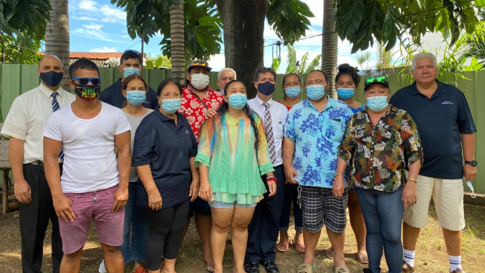 Members-of-the-Mata-Hotu-Association-for-the-Blind-and-Visually-Impaired,-leaders-of-The-Church-of-Jesus-Christ-of-Latter-day-Saints-and-Latter-day-Saint-Charities-gather-for-a-photo.--French-Polynesia,-May-2021