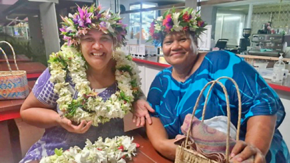 Tarani-Napa-and-Sharon-Connal-wearing-traditional-Cook-Islands-flower-crowns-called-'ei-katu-during-district-conference-in-Avarua.-New-Zealand,-April-2022.