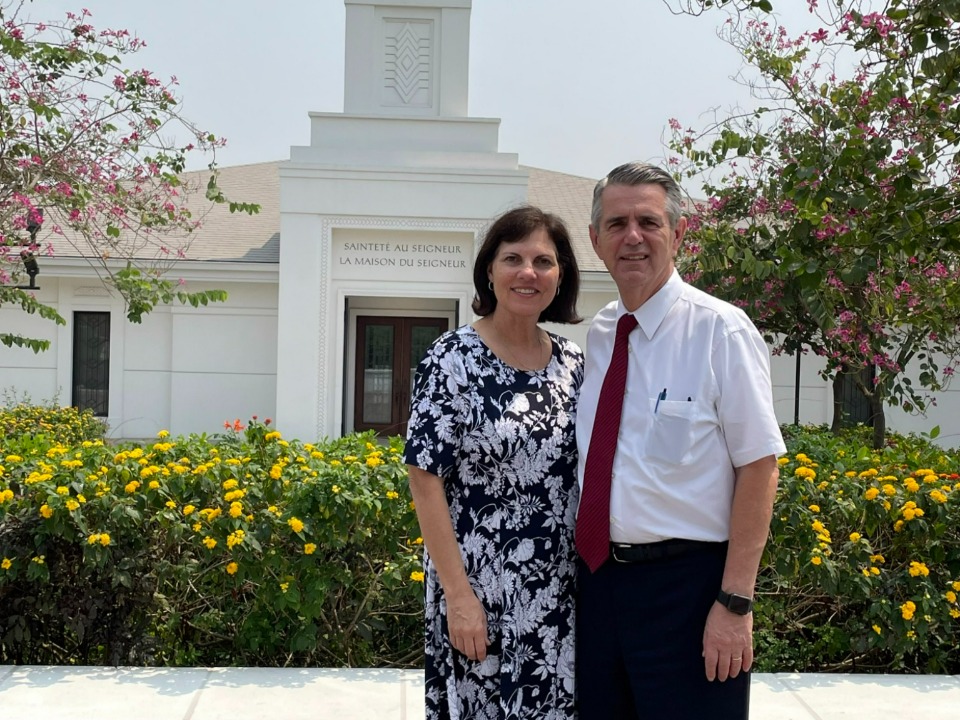 Elder and Sister Ardern in front of the Kinshasa Democratic Republic of the Congo Temple.