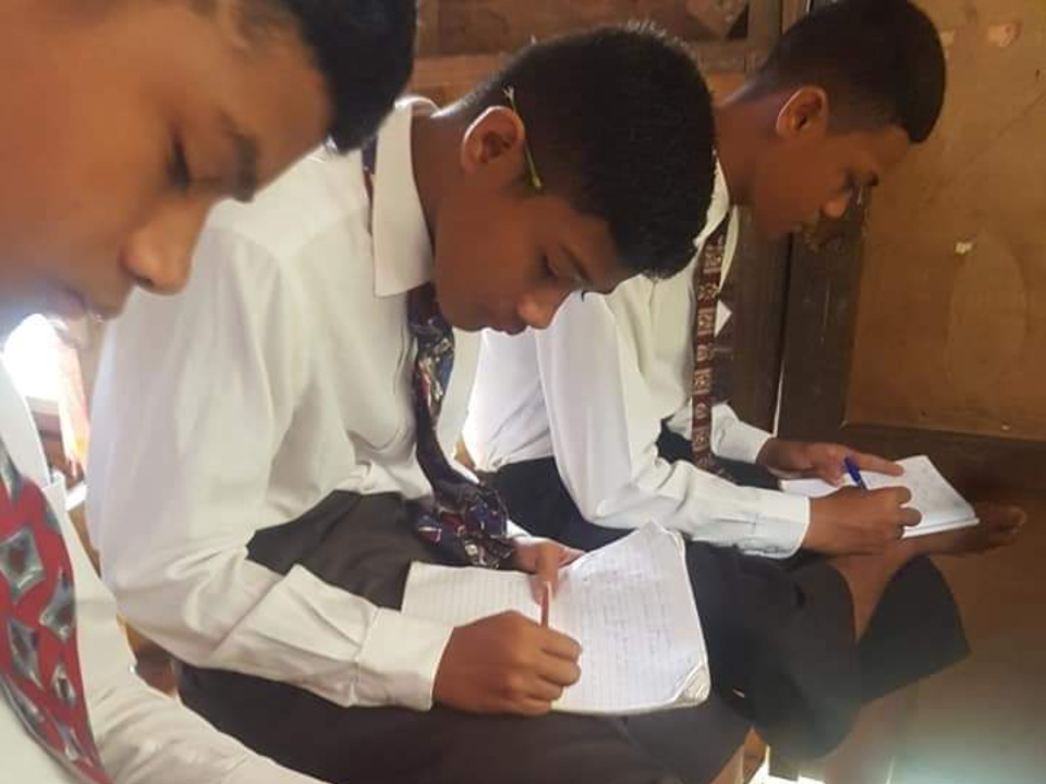 Samoan-young-men-taking-notes-during-General-Conference-Oct-2021