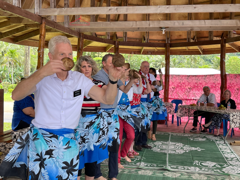 Missionary-doctors-and-spouses-take-part-in-the-traditional-'Coconut-Dance'-as-a-sign-of-appreciation-for-their-service-to-the-people-of-American-Samoa.-July-2022